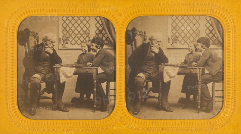 Elderly man playing checkers with two children, 1855-1860. Creator: Unknown.