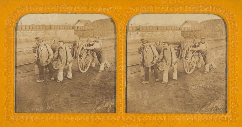 Men pushing and pulling a wagon, 1855-1860. Creator: Unknown.