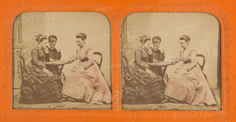 Three women at a table playing a game, 1855-1860. Creator: Unknown.