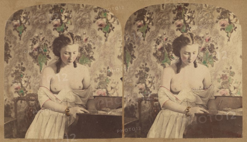 Bare-breasted woman looking down, about 1870. Creator: Unknown.