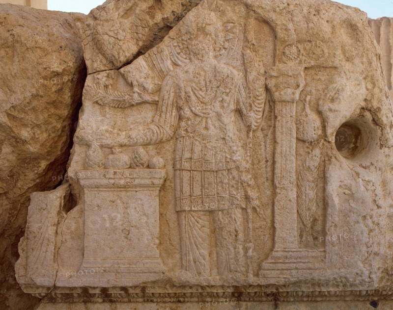 Relief depicting the god Aglibol, Temple of Bel, Palmyra, Syria, 2002.  Creator: Unknown.