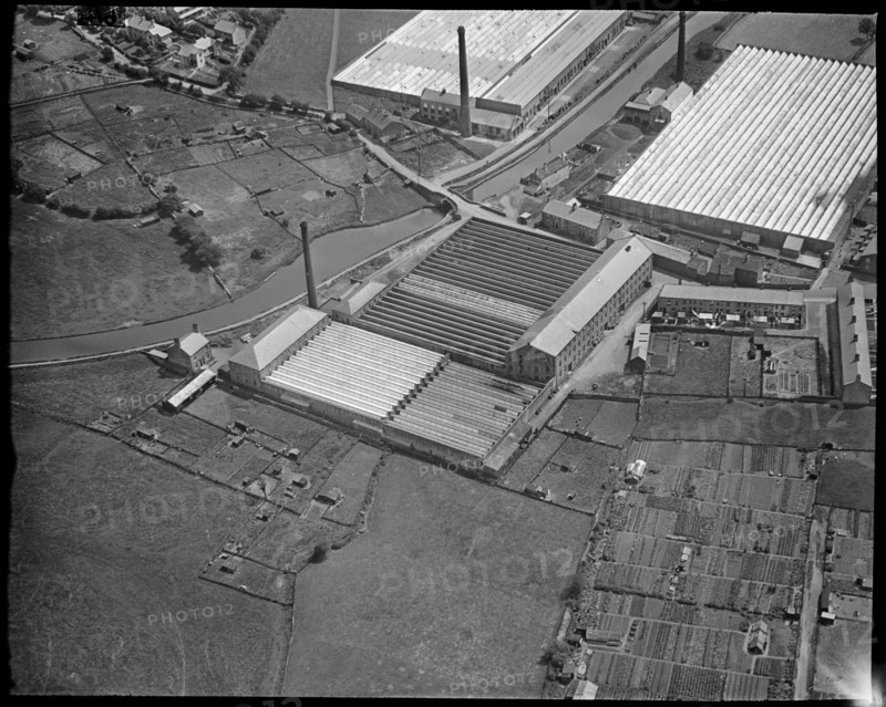 Long Ing Shed and nearby mills by Long Ing Bridge, Barnoldswick, Lancashire, c1930s. Creator: Arthur William Hobart.