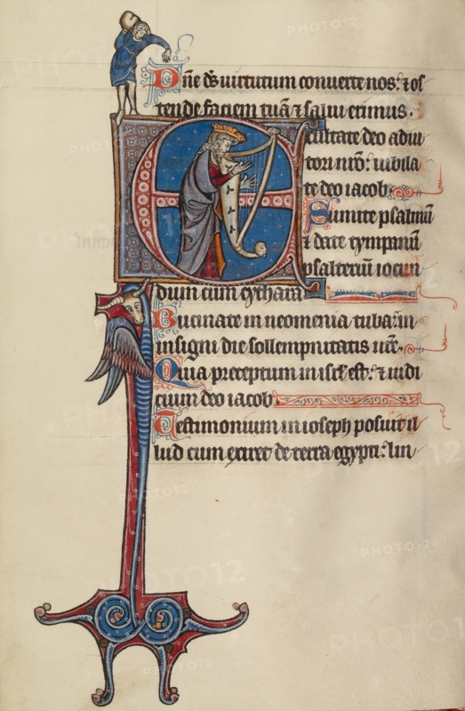Initial E: David Playing the Harp and a Man Heaving a Rock, text and illumination about 1285. Creator: Bute Master.