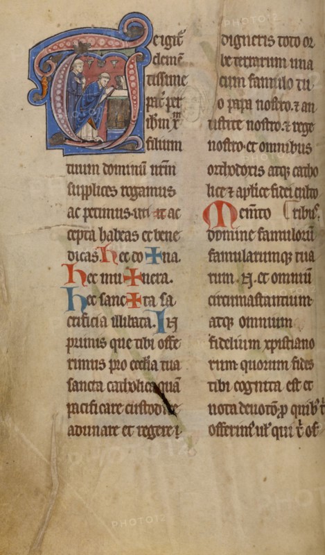 Initial T: A Priest Celebrating Mass; Missal, begun after 1234-completed before 1262. Creator: Unknown.