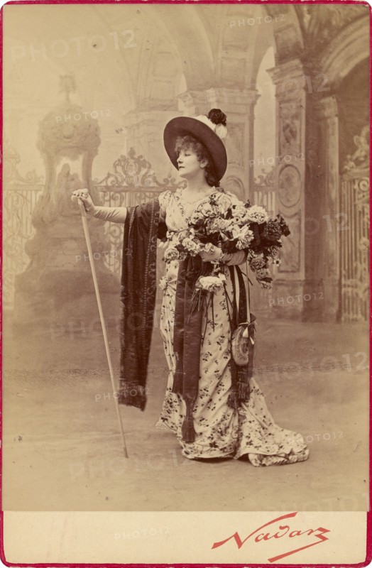 Sarah Bernhardt as Floria Tosca in Act I of Sardou's 'Tosca', neg 1887; print and mount after 1889. Creator: Nadar.