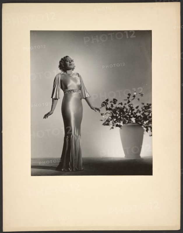 Portrait of woman in gown, late 1930s. Creator: Gunther Krampf.