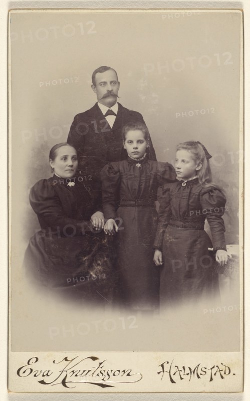 Family portrait: mother, father, and two daughters, 1895-1912. Creator: Eva Knutsson.