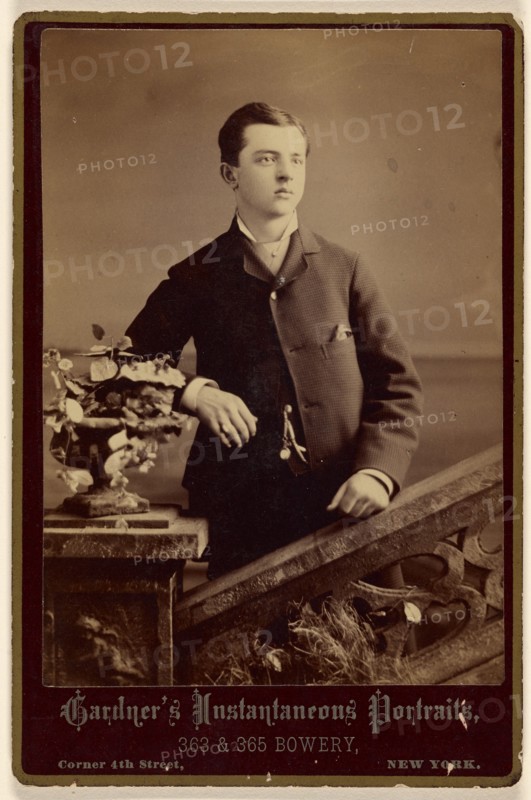 Unidentified well-dressed young man, standing, about 1880. Creator: Gardner.