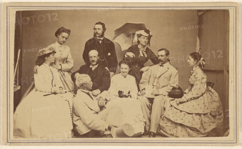 Group portrait of nine men and women, 1864-1866. Creator: H Wentworth.