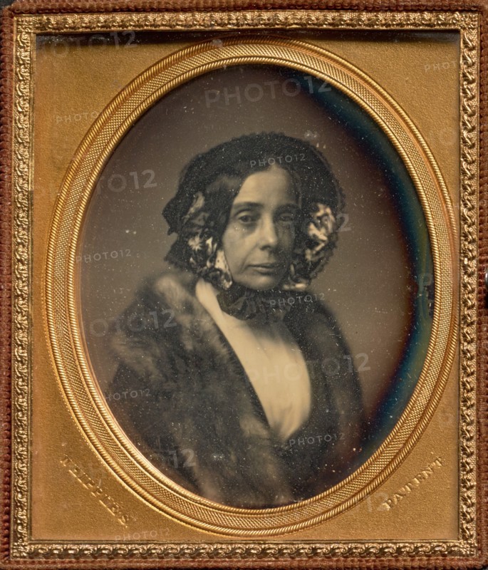 Portrait of a Middle-aged Woman in Bonnet and Fur Wrap, 1846-1853. Creator: John Adams Whipple.