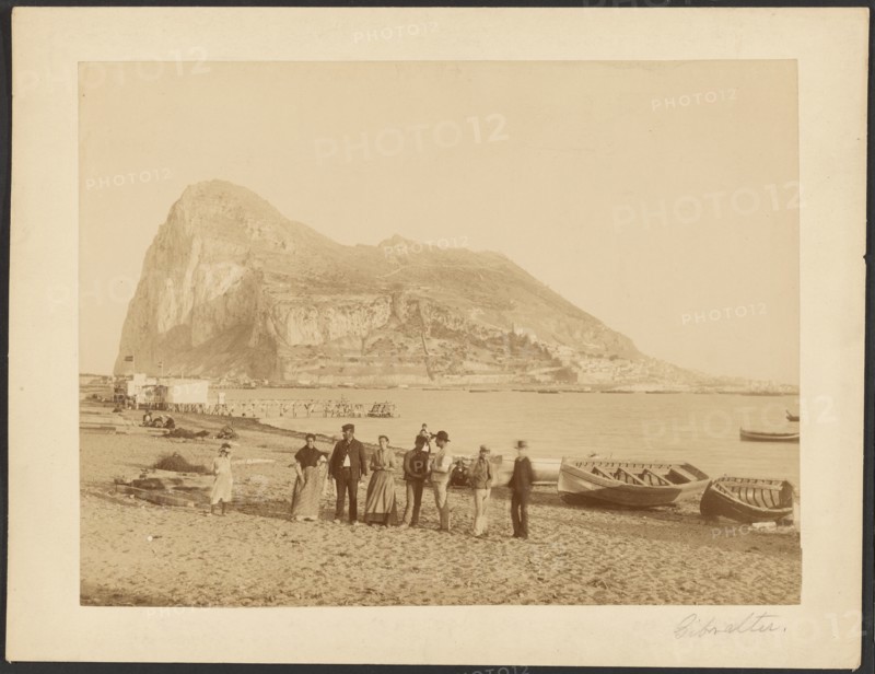 Group portrait in front of Rock of Gibraltar, about 1880-1895. Creator: Unknown.