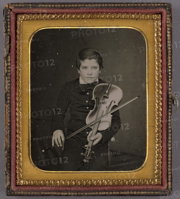 Portrait of a Seated Boy with a Violin, about 1850-1855. Creator: Unknown.