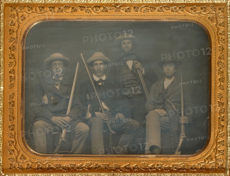 Portrait of four men with rifles, 1850s. Creator: Unknown.