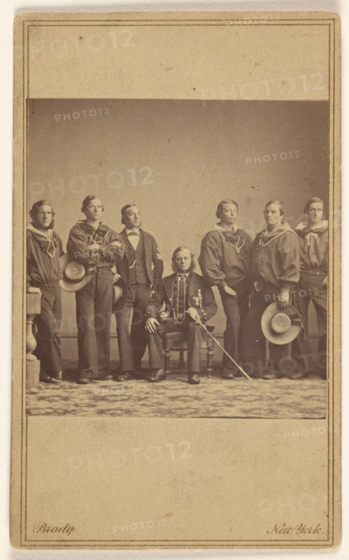 Group of military personnel, one being seated, about 1862. Creator: Mathew Brady.