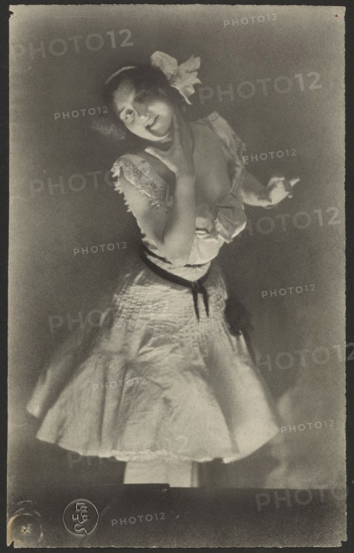 Portrait of woman in white dress, 1900-1915. Creator: Constant Puyo.