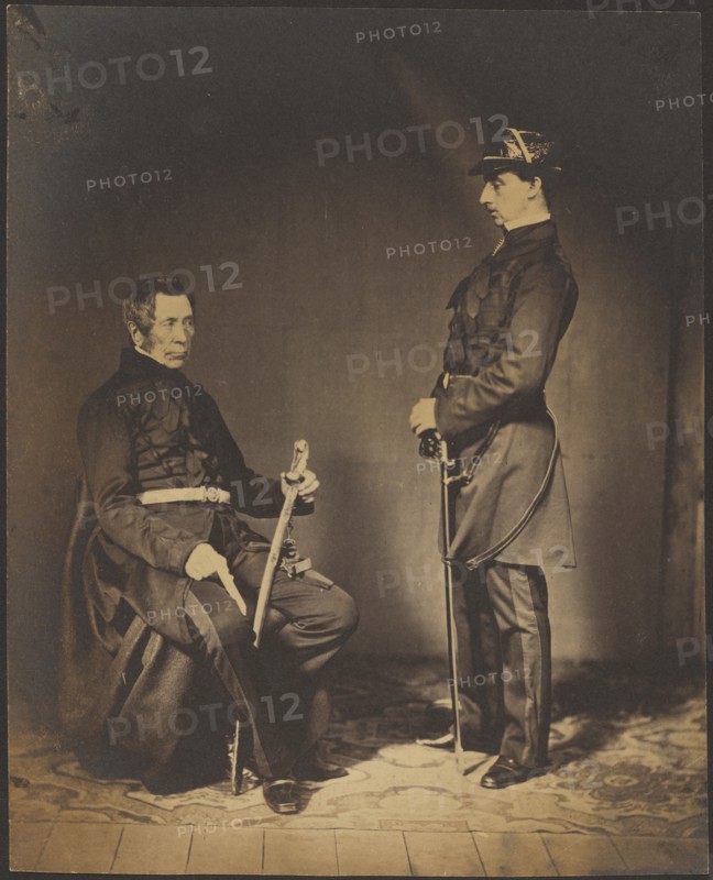 Lt. Gen. Sir Burgoyne, G.C.B. Seated in Dress Uniform with Aide to his Right, 1855. Creator: Roger Fenton.