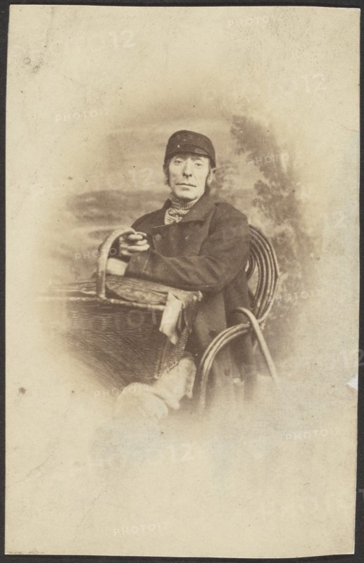 Portrait of a Seated Man with Basket, late 19th century. Creator: Unknown.