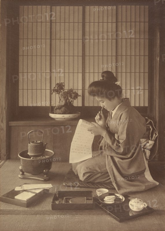 Writing a Letter, 1904-1910. Creator: Herbert Ponting.