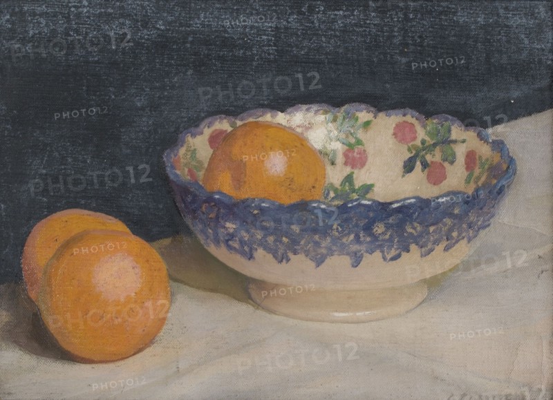 Still life with patterned bowl and oranges, probably 1920s/30s. Creator: George Clausen.
