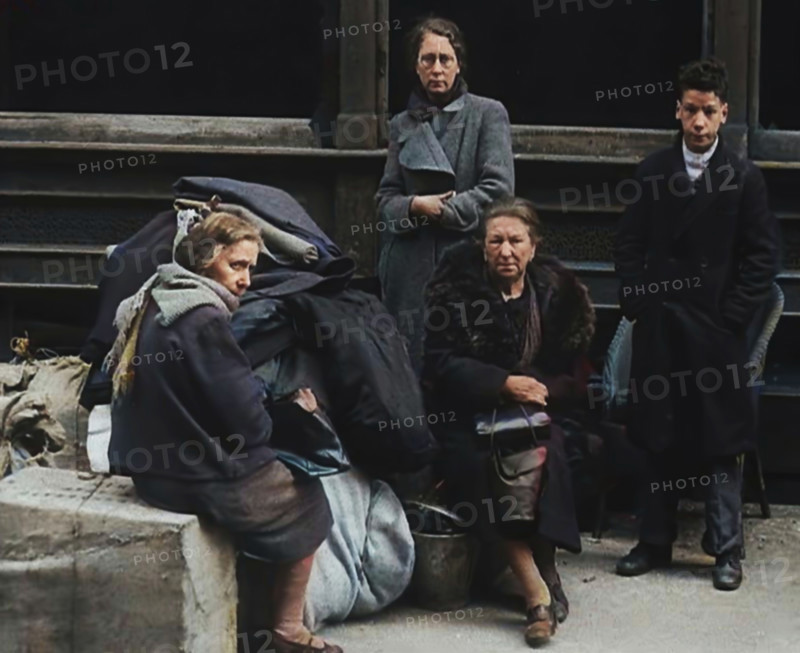 Civilians Surrounded by Bombed Out Buildings, 1940. Creator: British Pathe Ltd.