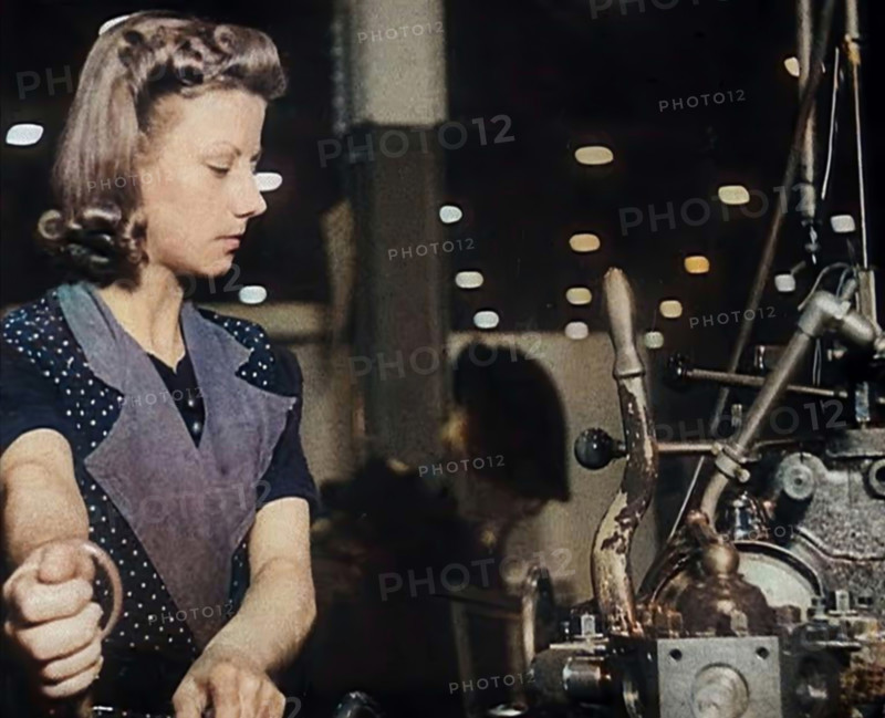 Woman Working in a Factory, 1940. Creator: British Pathe Ltd.