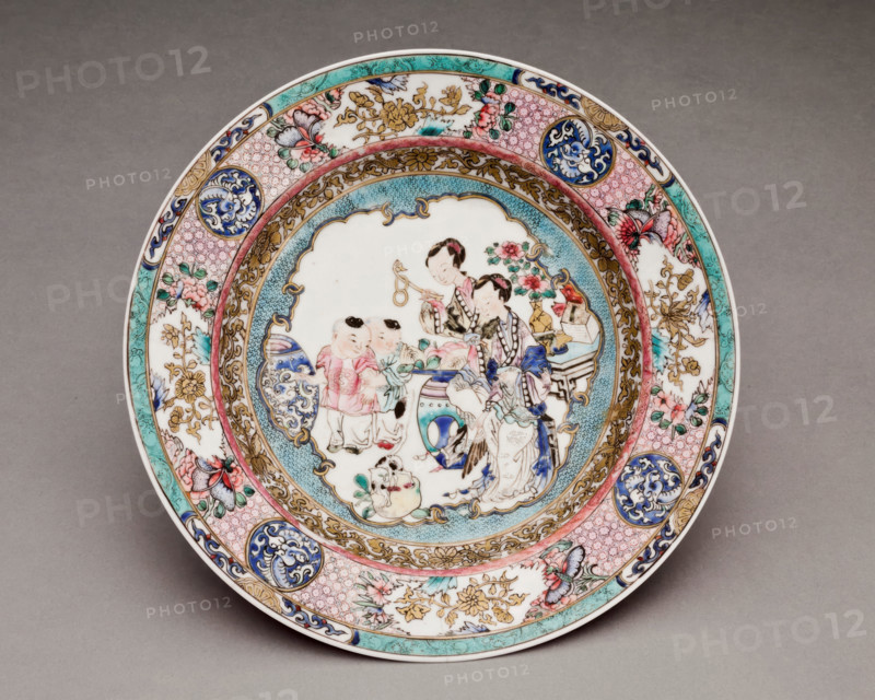 Plate with women and children scene, 1900-1950. Creator: Unknown.