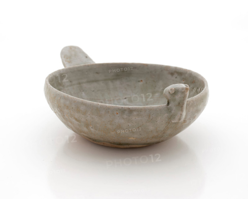 Shallow dish with bird head and tail, 265-316. Creator: Unknown.