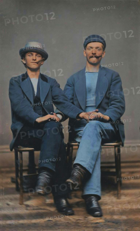 Two Seated Young Men Holding Hands, 1880s. Creator: Unknown.