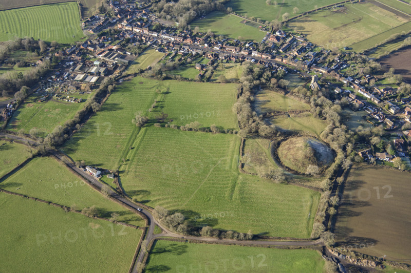Earthwork remains of motte and bailey castle and ridge and furrow cultivation, Brinklow, Warks, 202 Creator: Damian Grady.