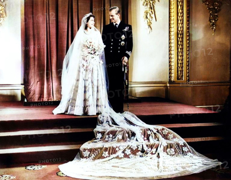 Queen Elizabeth II (b1926) and Prince Philip (b1921), 1947. Wedding photograph. (Colorised black and white print).