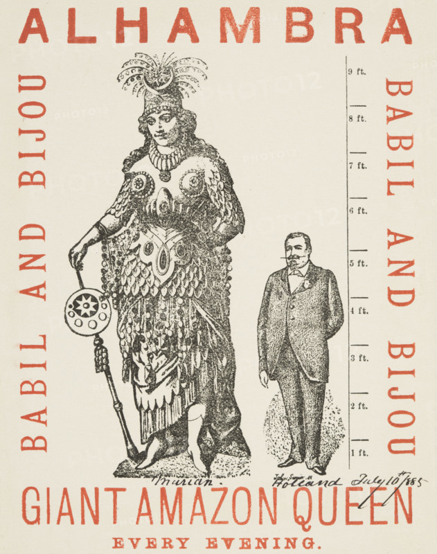 Giant Amazon Queen performing at the Alhambra, 1885. Advertisement for Marian Holland, who performed as the Giant Amazon Queen, starring in the operetta, 'Babil and Bijou' at the Alhambra Theatre, Leicester Square. She was born on January 31 1866 in Benkendorf, Germany, with giantism, and was 8 feet 2 inches tall. Holland is depicted in full costume standing next to an average-sized man.