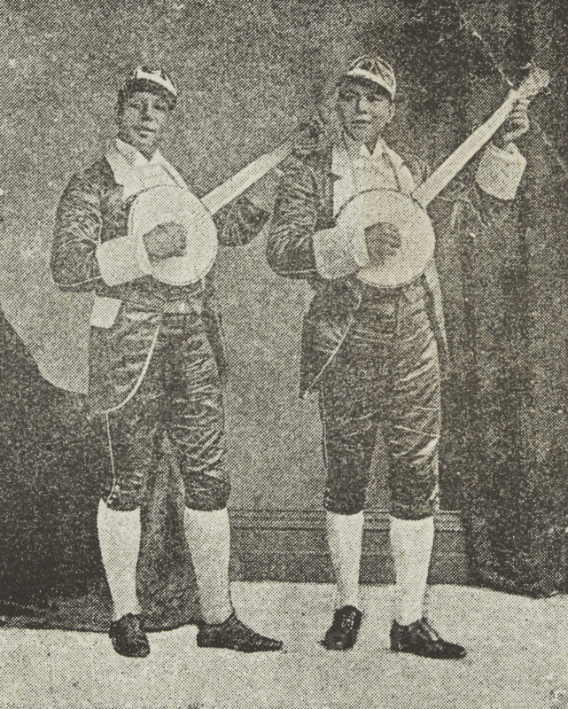 The Bohee Brothers, late 19th century. Photograph of James and George Bohee from a poster advertising their performance at International Hall, Piccadilly Circus, London. The Bohees were Black banjo players born in Canada who lived in the USA and Britain. They set up 'The Bohee Operatic Minstrels', a company of 30 musicians, singers and dancers, and toured Britain in the 1880s. The brothers imported new, improved banjos from the USA, fuelling the increasing popularity of the banjo in the UK. This interest was widespread in the 19th century but was especially popular with upper-class society. The brothers even opened a banjo academy in London's West End, where they are said to have taught the Prince of Wales, who later became King Edward VII.