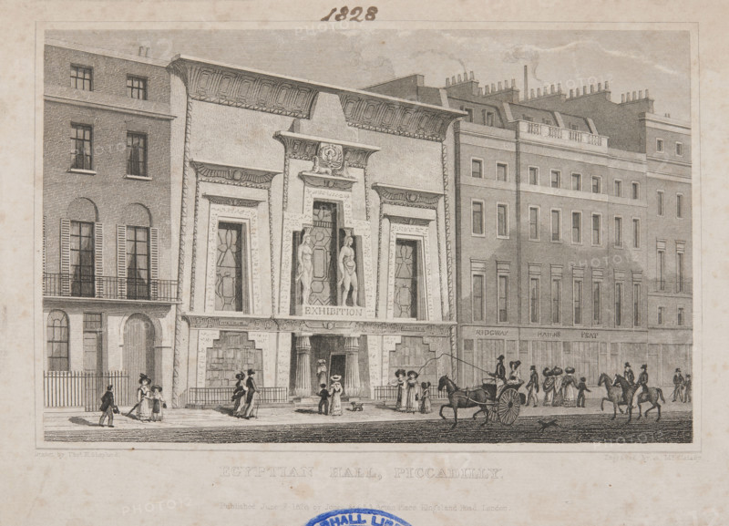 Egyptian Hall, Piccadilly, 1828. The Egyptian Hall in London was designed by Frederick Robinson and built in 1812. It was commissioned by William Bullock as a museum to house his collection, but was converted into an exhibition space in 1819.