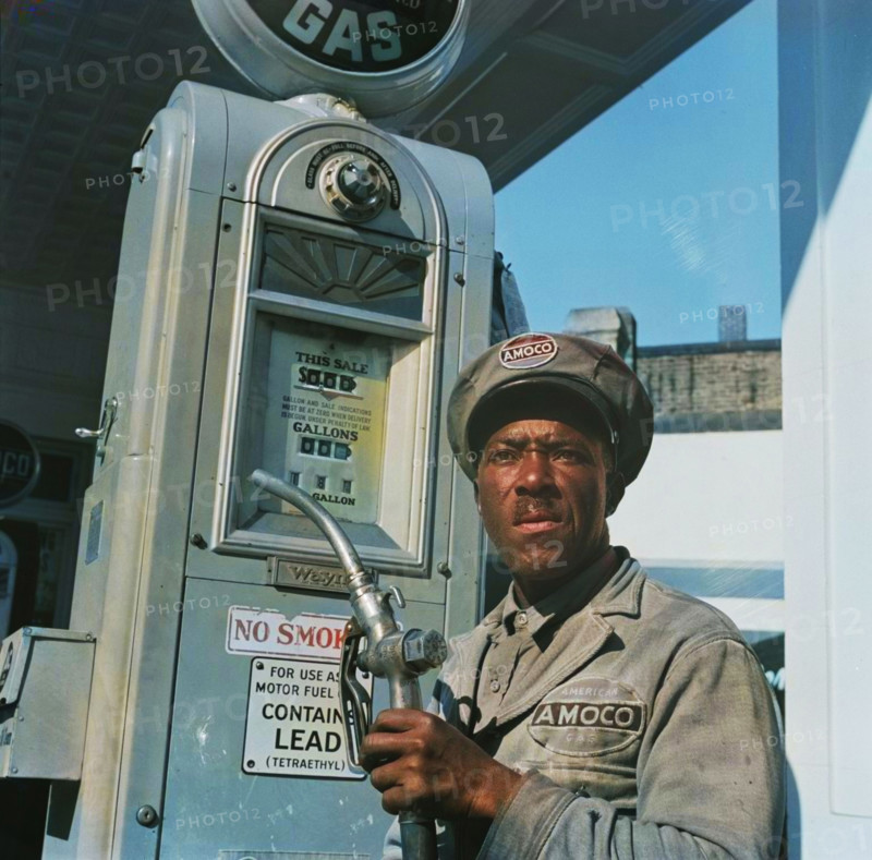 [Untitled photo, possibly related to: Washington, D.C. Negro mechanic for the Amoco oil company]. (Colorised black and white print).