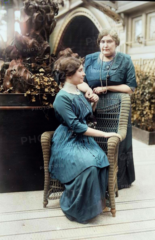 Helen Keller & Mrs. Macy, 1913. Shows Helen Keller (1880-1968) with her teacher Anne Sullivan Macy (1866-1936) possibly at the International Flower Show, New York City, April 1913. (Colorised black and white print).