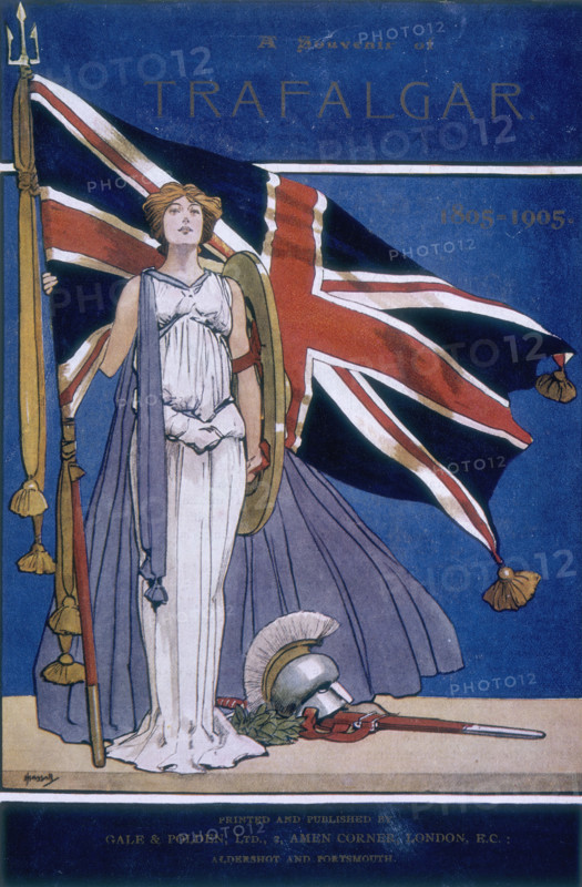 Britannia standing in front of the Union Jack, 1905. 'A souvenir of Trafalgar, 1805-1905' celebrates the centenary of the Battle of Trafalgar, a key event in the Napoleonic Wars in which Admiral Nelson fought the French and Spanish.
