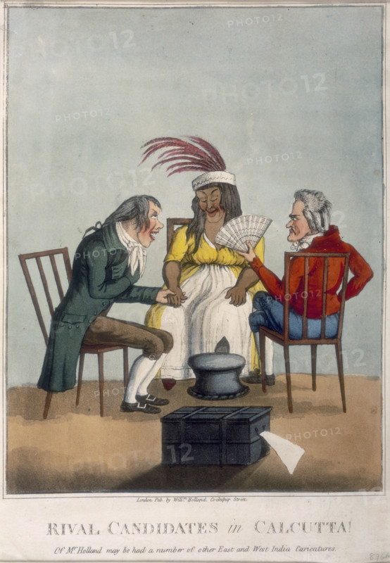 'Rival Candidates in Calcutta', 1813. A woman wearing a feathered hat, an allegorical figure representing India, is flattered by a European who holds her hand and makes eyes at her. His rival sits holding a fan and looking annoyed. In the foreground is a ballot box. Britain and France were rivals for control of India in the late 18th and early 19th centuries. 'Of Mr. Holland [the publisher] may be had a number of other East and West India Carictures'.