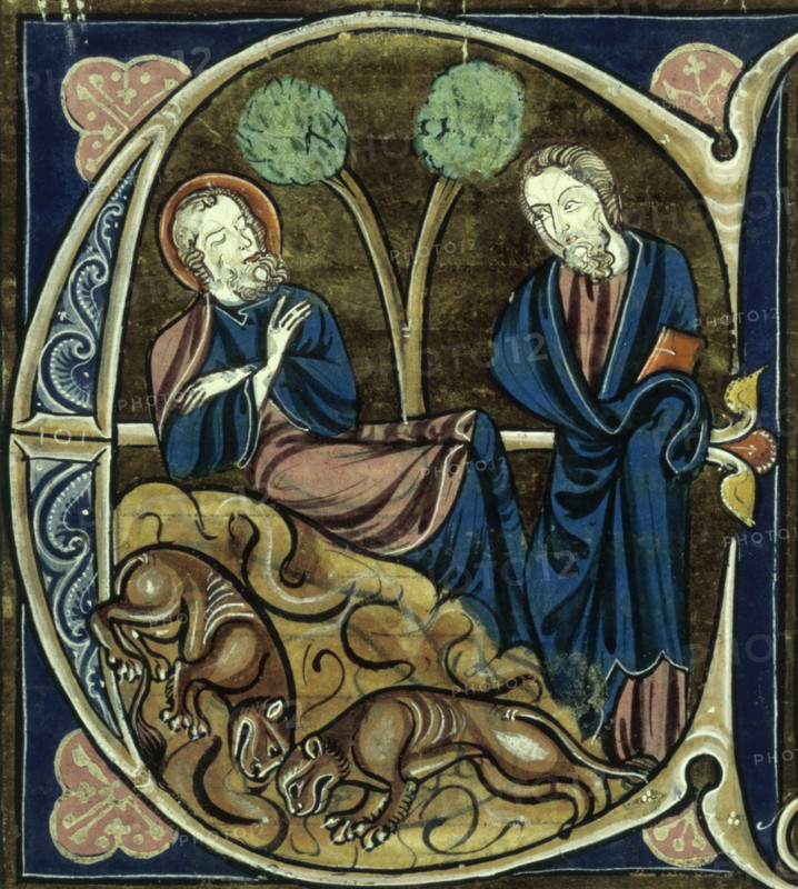 St Patrick sleeping, 13th century. Patrick is asleep on a rock, watched over by Christ, while beneath the rock are sleeping animals representing the unconverted.