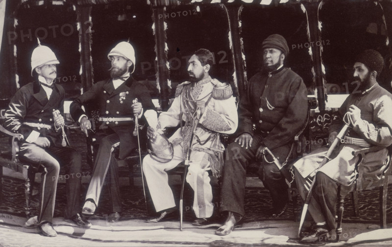 The Amir of Afghanistan with officials, Gandamak, Afghanistan, May 1879. During the Second Afghan War, Afghanistan became a British protectorate under the Treaty of Gandamak, which was signed by the Amir, (centre), and Lord Lytton the Viceroy of India, on May 26, 1879. Also present were Sir Louis Cavagnari, political officer on special duty; Mr Jenkyns; General Daud Shah; and Habeeboolah Mustataphi. Several months later Afghan soldiers rioted over pay; Cavagnari and Daud Shah were both killed.