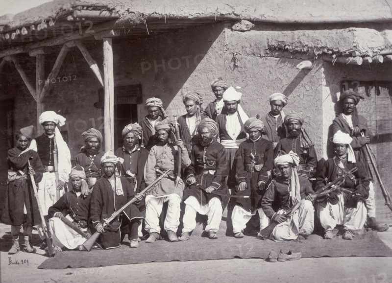 Kabul Police, Afghanistan, c1880. Police with rifles outside a mud-built building.