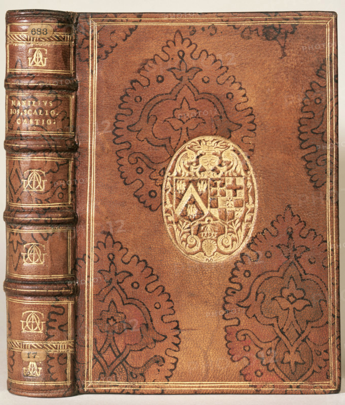 Book binding made for Jacques-Auguste de Thou, c1606. This gold-tooled and stencilled binding for the French historian and book collector Jacques-Auguste de Thou shows his arms impaling those of his second wife, Gasparde de la Chastre.