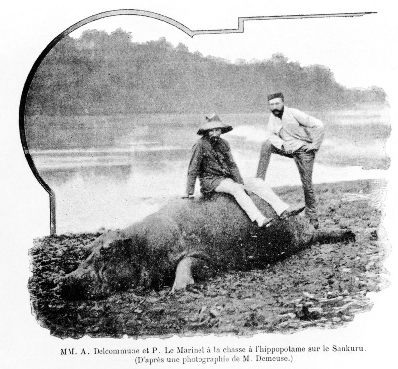 Alexandre Delcommune and Paul Le Marinel hunting hippopotamus on the Sankuru, Congo late 19th-early 20th century. 'MM. A Delcommune et P. Le Marinel à la chasse à l'hippopotame sur le Sankuru. (D'après une photographie de M. Fernand De Meuse)'. Belgian hunters and army officers in Africa.