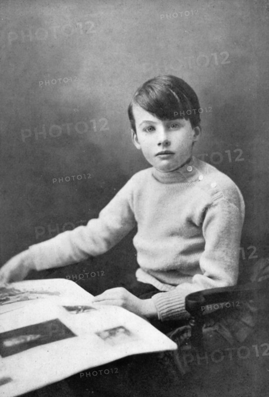 Raymond Wilfrid Sholto Douglas aged 9, 1911. Raymond Douglas (1902-1964) was the only child of Lord Alfred Douglas and Olive Custance. Alfred Douglas was famously involved in a homosexual relationship with Oscar Wilde. After Wilde died, Alfred Douglas married Custance who was also bisexual. From "Oscar Wilde and Myself" by Lord Alfred Douglas. [London, 1914].