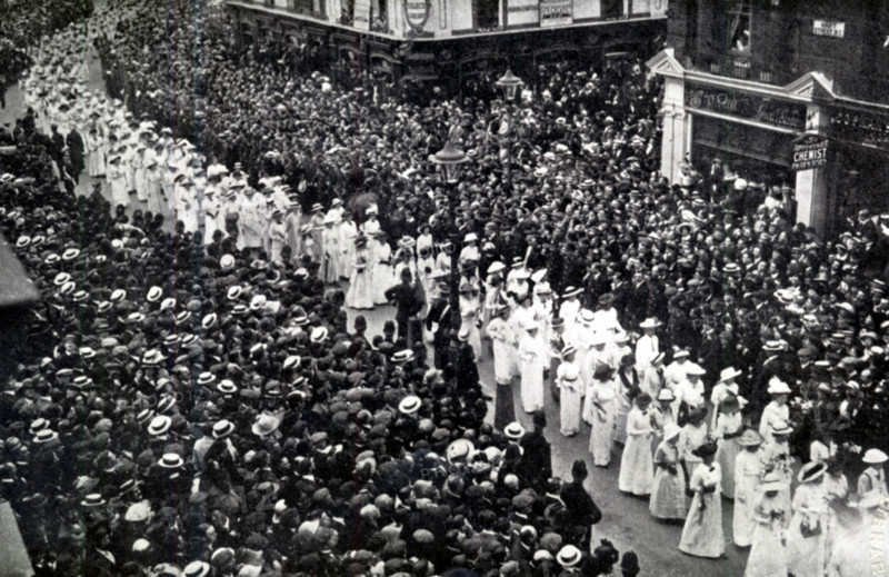 The Cortege of Emily Wilding Davison, London, June 14, 1913. British suffragette Emily Wilding Davison (1872-1913) fought for votes for women. A member of the Women's Social and Political Union (WSPU) and a militant fighter for her cause, she was arrested on nine occasions, went on hunger strike seven times and was force-fed on forty-nine occasions. She died after being hit by King George V's horse Anmer at the 1913 Derby when she walked onto the track during the race. Her funeral was organised by the WSPU. A procession of 5,000 suffragettes and their supporters accompanied her coffin and 50,000 people lined the route through London. From "The Suffragette Movement. An intimate account of persons and ideals" by E Sylvia Pankhurst . [1931].