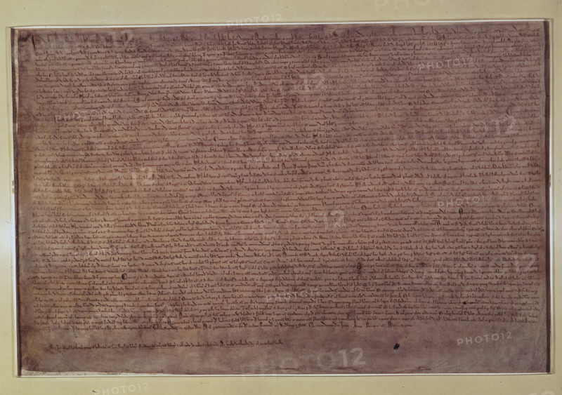 The Magna Carta, 1215. The Magna Carta (The Great Charter); King John's Charter of Liberties. One of four surviving exemplifications issued over the Great Seal of King John on and after 23rd June 1215.