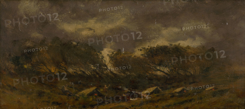 Gypsy camp during a storm, 1910-1930.