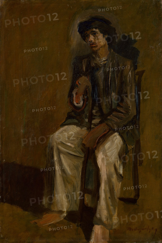 Seated Gypsy with a Staff, around 1900.