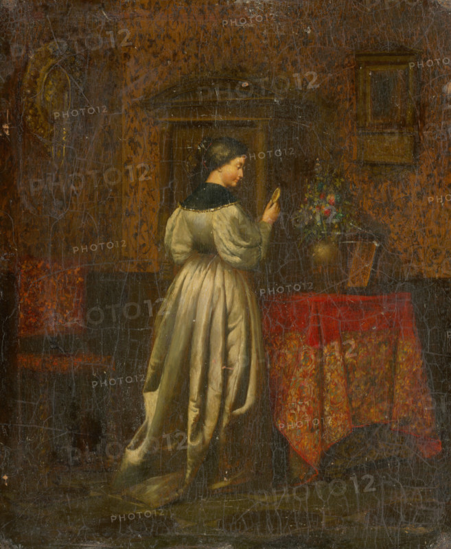 Woman with a miniature, 1850-1870.
