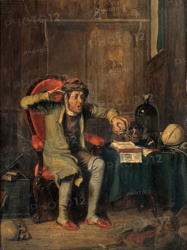An anxious man comparing his own head to a skull, using the technique of phrenology, 1820-1829. Creator: Theodore Lane.
