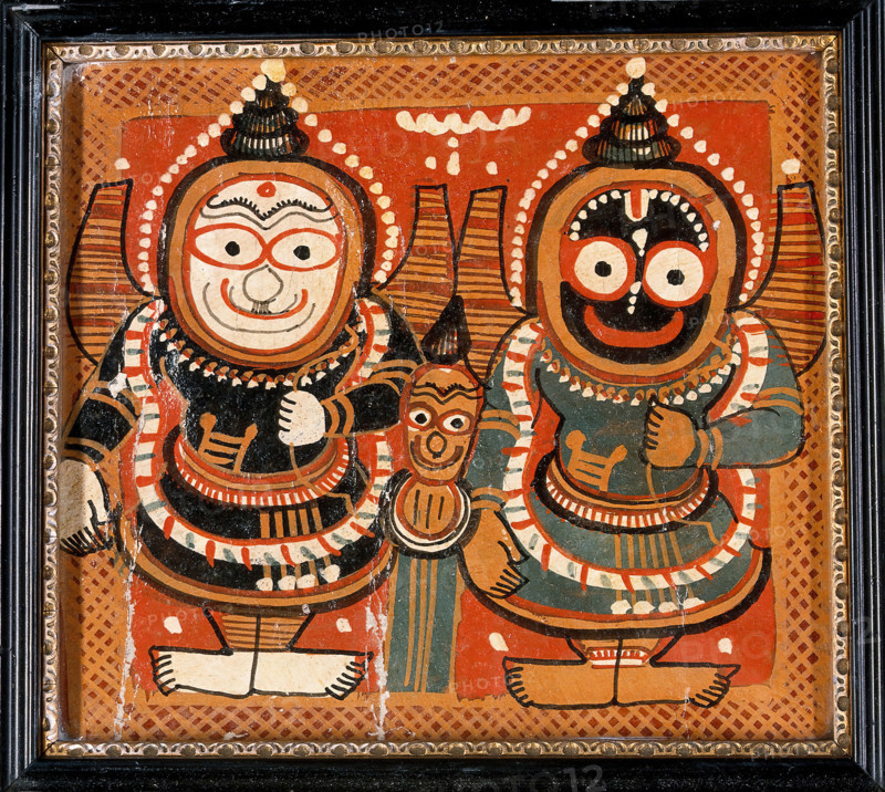 Balarama and Jagannath holding bows in their left hands, with Subhadra between them, c1880/1910. Creator: Unknown.